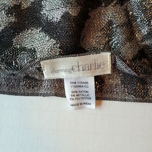 Charming Charlie's black and silver circle scarf.